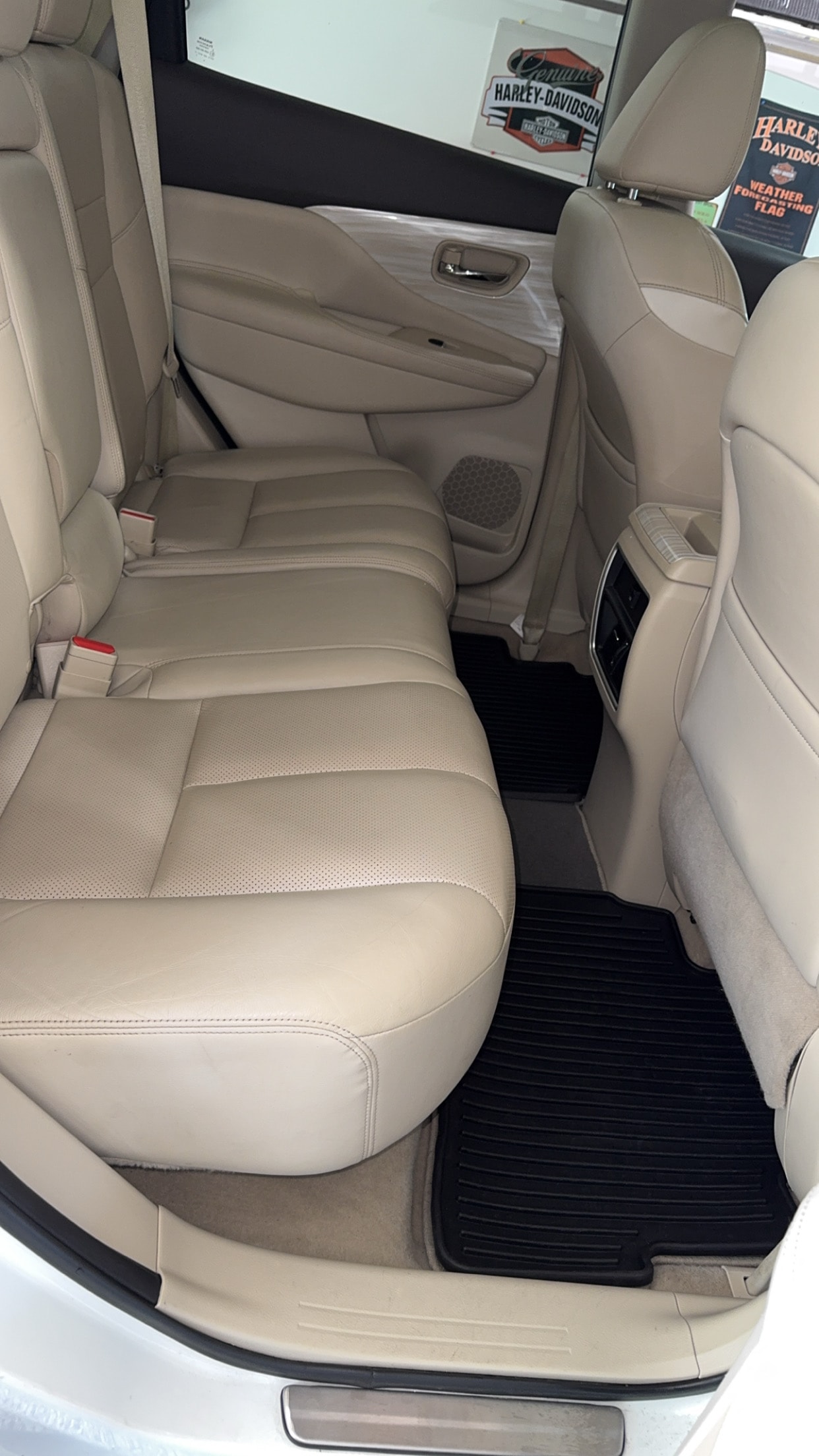 Interior detail — cream leather rear seating