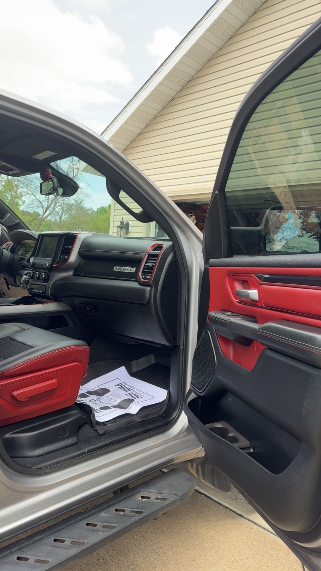 Interior detail — Ram truck red and black cabin